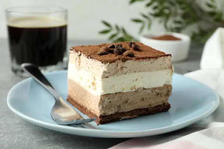 Discover how to make a Tiramisu Layer Cake with our easy-to-follow recipe. Indulge in layers of espresso-soaked cake and creamy mascarpone